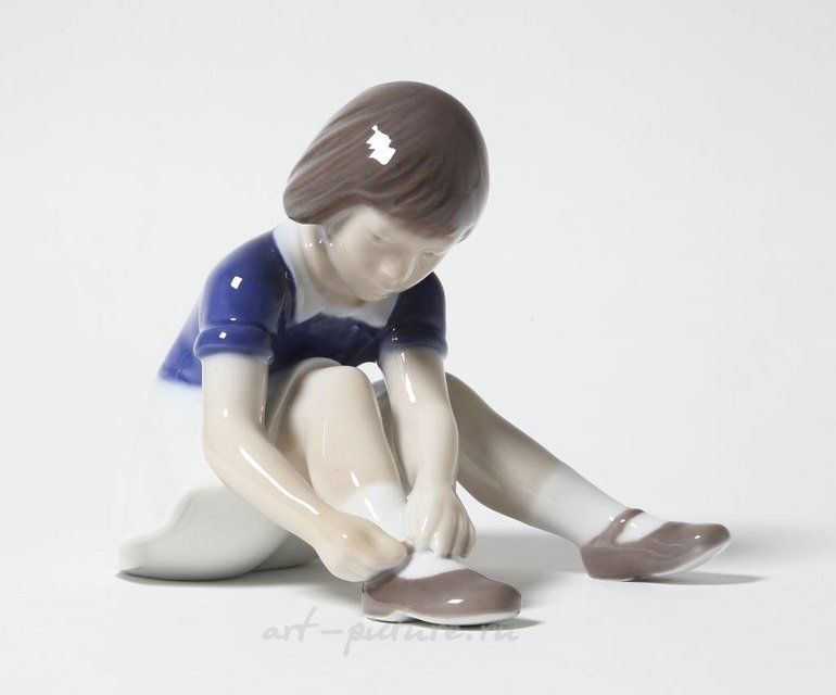 "Girl fastening her shoe. Denmark, Copenhagen, Bing & Grondahl."