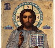 Икона, изображающая Христа с частично серебряной ризой...