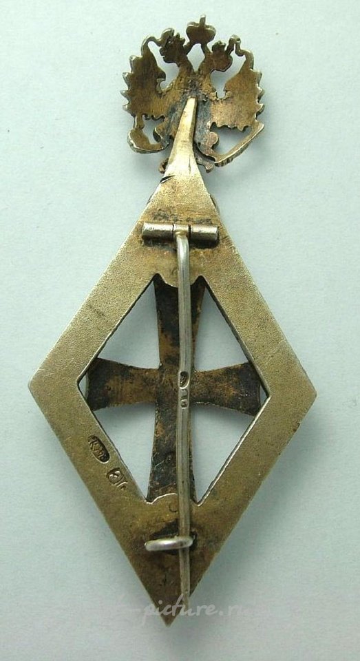 Russian silver , RUSSIA: ca 1900 Breast badge for a Graduate of a