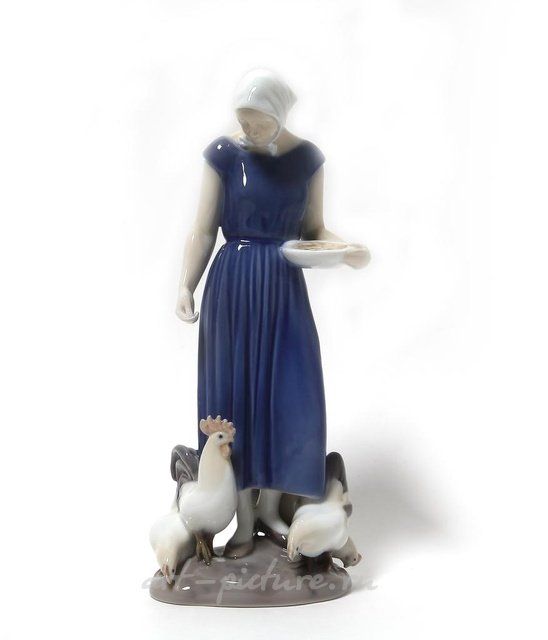 喂鸟的女孩。丹麦，哥本哈根，Bing & Grondahl