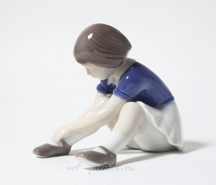 "Girl fastening her shoe. Denmark, Copenhagen, Bing & Grondahl."