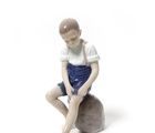 buy "Boy rolling up his pant leg. Denmark, Copenhagen, Bing & Grondahl."