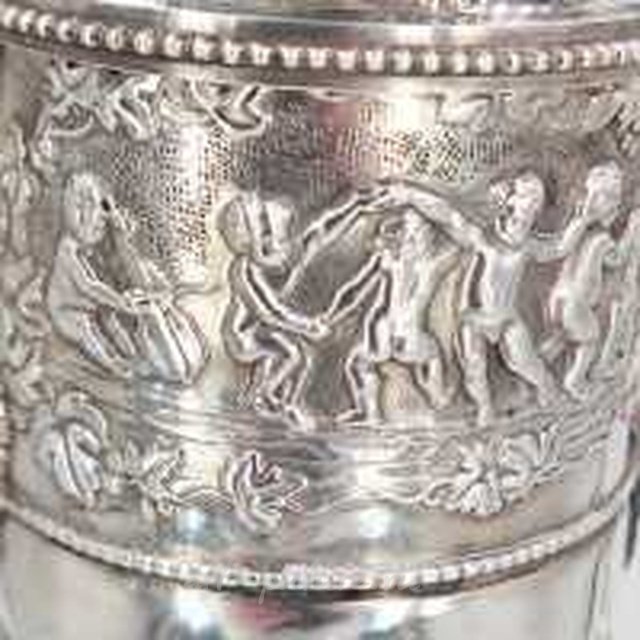Графин из серебра 925-й пробы с изображением Бахуса и путти