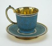 Серебряная чашка и блюдце с эмалью в технике клоизонне