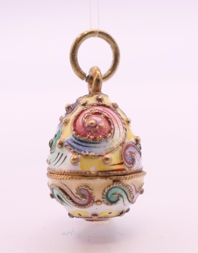 Russian silver , A Russian silver enamel egg pendant. 3 cm high.