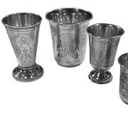 Четыре русских металлических серебряных рюмки для водки.