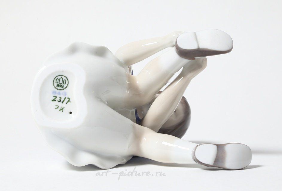 "Girl fastening her shoe. Denmark, Copenhagen, Bing & Grondahl."